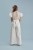 girls jumpsuit for special occasions, elegant girls jumpsuit, Beatrice girls jumpsuit, communion jumpsuit for girls, girls party outfit, lace back jumpsuit for kids, European-made girls jumpsuit, cream-white occasion wear for girls