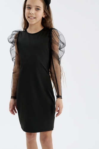 Girl in the black Elena dress with tulle sleeves, front view
